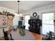 Elegant dining room with vintage decor, natural light, and decorative wall accents at 101 Cardinal Dr, Youngsville, NC 27596