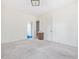 Bright bedroom featuring neutral carpet, a sink, and doorways at 10186 W Nc-97 Hwy, Middlesex, NC 27557