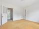 Bedroom with white walls, an open door, and neutral flooring at 10186 W Nc-97 Hwy, Middlesex, NC 27557