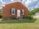 Charming brick home with black shutters and a well-maintained lawn at 10186 W Nc-97 Hwy, Middlesex, NC 27557