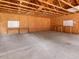 Interior view of the unfinished two-car garage showing tables and lighting at 10186 W Nc-97 Hwy, Middlesex, NC 27557