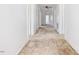 Long hallway featuring neutral carpet and a ceiling fan at 10186 W Nc-97 Hwy, Middlesex, NC 27557
