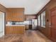 Open floor plan kitchen with wood cabinets, stainless steel appliances, and eat-in area at 10186 W Nc-97 Hwy, Middlesex, NC 27557
