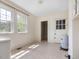 Functional utility room includes a window, a water heater, and a door to a pantry providing ample space at 10186 W Nc-97 Hwy, Middlesex, NC 27557