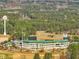 Expansive aerial view of a baseball field and stadium, surrounded by trees at 1024 Channel Drop, Zebulon, NC 27597