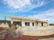 View of clubhouse patio with stone features and landscaping at 1024 Channel Drop, Zebulon, NC 27597