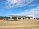 Exterior view of the modern clubhouse with stylish architecture and landscaping at 1024 Channel Drop, Zebulon, NC 27597