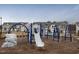 Community playground features slides, climbing areas, and play structures at 1024 Channel Drop, Zebulon, NC 27597
