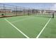 Close-up of the community tennis court with the homes in the background at 1024 Channel Drop, Zebulon, NC 27597
