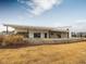 Beautifully designed clubhouse exterior with modern architecture and inviting outdoor space at 1033 Channel Drop Lp, Zebulon, NC 27597