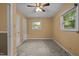 Bedroom with two closets, two windows, and a ceiling fan at 108 Jefferson Dr, Durham, NC 27712