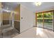 Hallway with access to the back yard through the sliding glass door at 108 Jefferson Dr, Durham, NC 27712