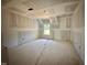 Unfinished bedroom showcases a window, and offers potential for customization at 109 Moonflower Ln # Homesite 260, Wilson's Mills, NC 27520