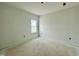 Bright bedroom featuring a single window, ready for finishing touches and personalization at 109 Moonflower Ln # Homesite 260, Wilson's Mills, NC 27520