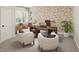 Well-lit home office with modern desk, decor and comfortable seating for work at 109 Moonflower Ln # Homesite 260, Wilson's Mills, NC 27520