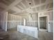 Unfinished living room exhibiting modern open space, with drywall and defined room divisions at 109 Moonflower Ln # Homesite 260, Wilson's Mills, NC 27520