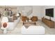 Inviting living room featuring a comfortable sofa, stylish armchairs, and an open floor plan at 109 Moonflower Ln # Homesite 260, Wilson's Mills, NC 27520