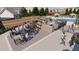 Community pool area featuring outdoor kitchen and dining, with resort-style pool, and cabanas for relaxation at 109 Moonflower Ln # Homesite 260, Wilson's Mills, NC 27520