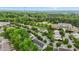 Aerial image displays a suburban landscape with lush trees, manicured lawns, and well-maintained townhome residences at 1096 Kelso Ln # 18, Burlington, NC 27215