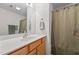 Bathroom featuring a wood vanity with a light countertop and a shower with a curtain at 1096 Kelso Ln # 18, Burlington, NC 27215