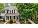 Charming townhome featuring a well-manicured front yard and a welcoming entrance at 1096 Kelso Ln # 18, Burlington, NC 27215