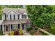 Charming townhome featuring a well-manicured front yard and a welcoming entrance at 1096 Kelso Ln # 18, Burlington, NC 27215