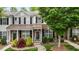 Charming townhome featuring a well-manicured front yard and a welcoming entrance at 1096 Kelso Ln # 18, Burlington, NC 27215