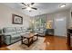 Bright and airy living room featuring hardwood floors and comfortable seating arrangement at 1096 Kelso Ln # 18, Burlington, NC 27215
