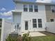 Backyard of a home with a concrete slab, a white fence and an air conditioner at 12 Lavender Ln, Clayton, NC 27520