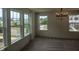 Bright, naturally lit living room with large windows overlooking the neighborhood at 12 Lavender Ln, Clayton, NC 27520