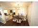 Open concept dining area is adjacent to the living room and has seating for six at 1211 Westview Ln # 201, Raleigh, NC 27605