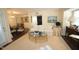 Open concept living room featuring hardwood floors, a comfortable couch, and stylish decor at 1211 Westview Ln # 201, Raleigh, NC 27605
