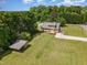 Aerial shot shows the house, shed, and the spacious surrounding area at 123 Sanders Road Rd, Benson, NC 27504