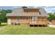 Exterior of a home with a wood deck and siding with central air unit at 123 Sanders Road Rd, Benson, NC 27504