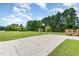 Image of a basketball court and open grassy space near the home at 123 Sanders Road Rd, Benson, NC 27504