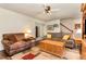 Spacious living room features hardwood floors, comfortable seating, and natural light at 123 Sanders Road Rd, Benson, NC 27504