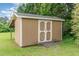Exterior of a shed featuring a side entry and wood ramp and door at 123 Sanders Road Rd, Benson, NC 27504