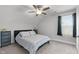 Comfortable bedroom featuring soft carpet, a queen bed with plush pillows and a ceiling fan at 15 Willow Bend Dr, Youngsville, NC 27596