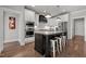 This kitchen boasts a stylish island, stainless appliances, and sleek white cabinetry at 15 Willow Bend Dr, Youngsville, NC 27596