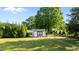 Backyard shed is perfect for storage and keeping your tools and equipment safe and dry at 15 Willow Bend Dr, Youngsville, NC 27596