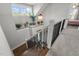 Carpeted staircase with views to the foyer and second level leading to the bedrooms at 15 Willow Bend Dr, Youngsville, NC 27596