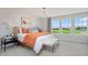 Bright main bedroom showcasing modern decor, a comfortable bed, and large windows with scenic views at 16 Hyacinth Ln # 101, Angier, NC 27501