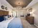 Bright main bedroom featuring striped walls, stylish décor, and neutral tones at 1602 Red Roses Way, Durham, NC 27703