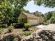 The exterior of this property features a two-car garage and landscaping at 1605 Park Dr, Raleigh, NC 27605