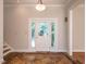 Elegant foyer with decorative tile flooring, a glass-paneled front door, and views of the staircase at 1605 Park Dr, Raleigh, NC 27605