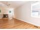 The living room includes a decorative fireplace, built-in shelving, and hardwood floors at 1605 Park Dr, Raleigh, NC 27605