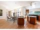 Open concept living room with dining area adjacent to kitchen at 1605 Park Dr, Raleigh, NC 27605