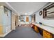 Open basement with half-wall trim, desk area, and closet space offers plenty of potential at 1924 Strebor St, Durham, NC 27705