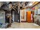 Unfinished basement area with exposed ductwork, concrete walls, and potential storage space at 1924 Strebor St, Durham, NC 27705