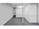 Clean basement with neutral paint and carpet at 1924 Strebor St, Durham, NC 27705